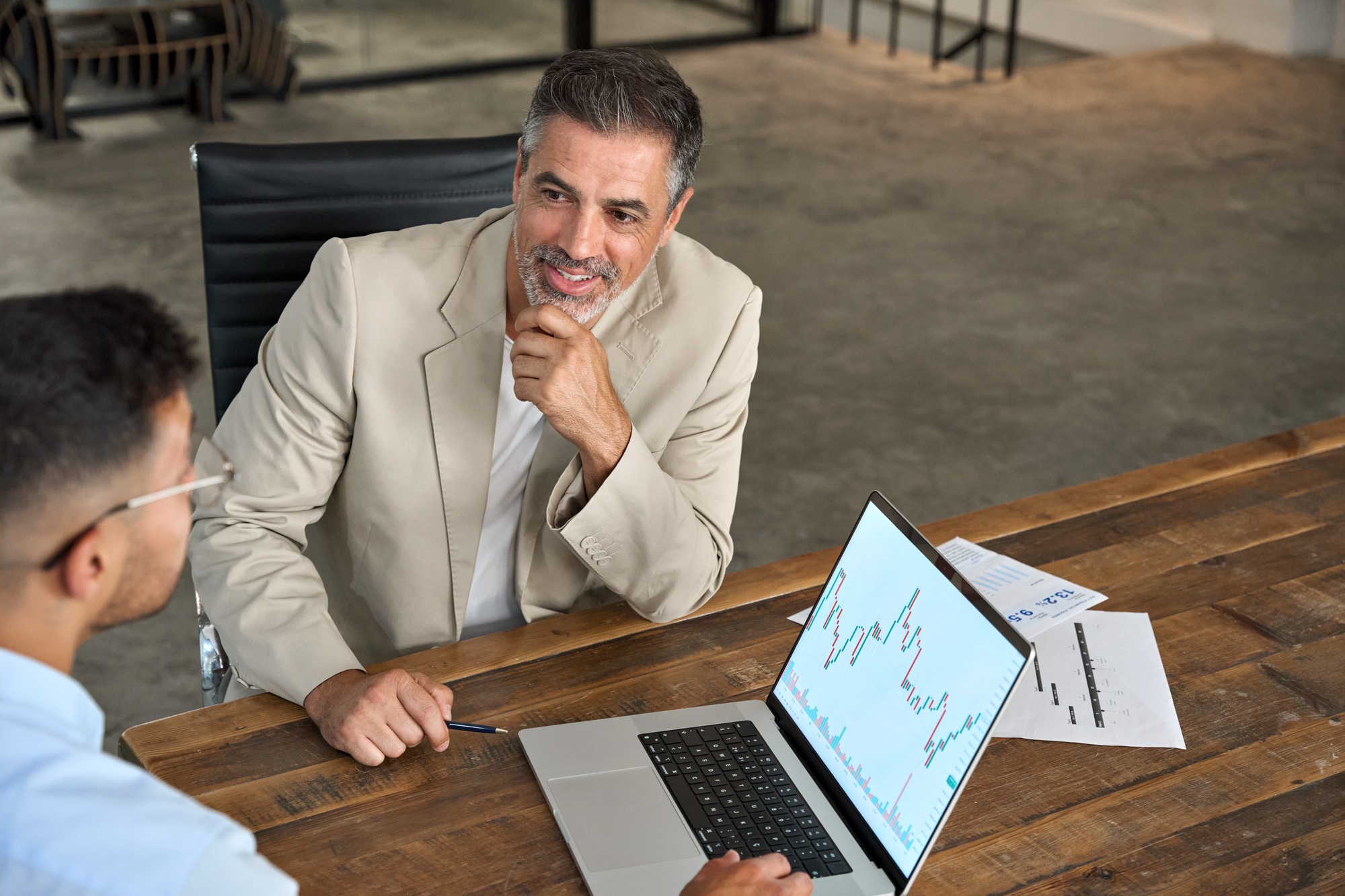 Advisor consulting businessman investor explaining financial trade stock market.